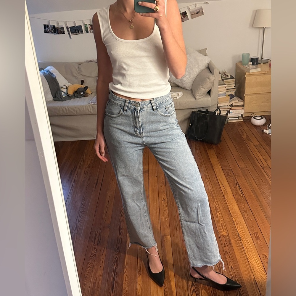 Light wash straight leg blue jeans